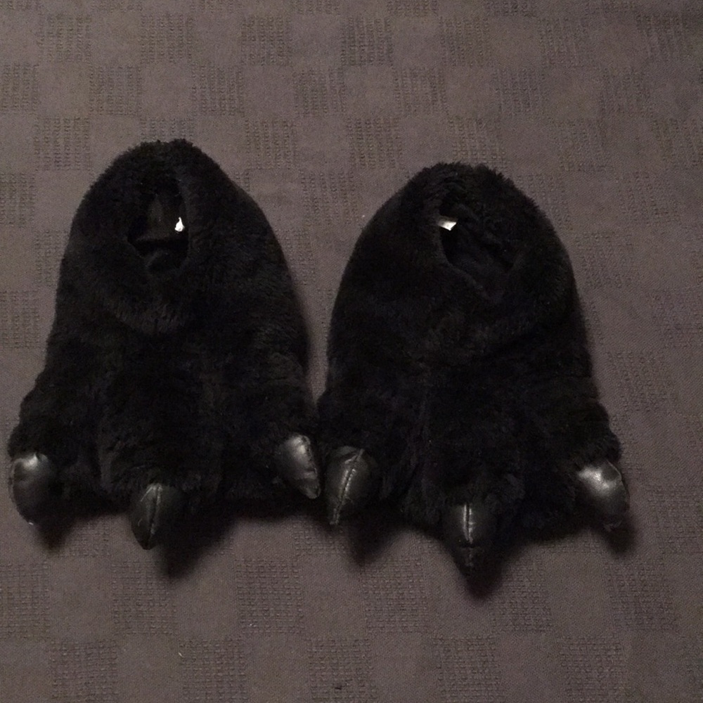 Boys animal claw slippers.